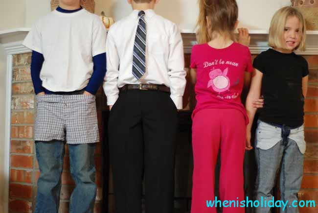 Children dressed up backward