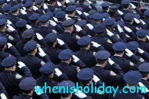 Policemen saluting
