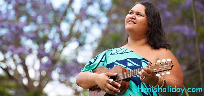 A woman Playing Ukulele