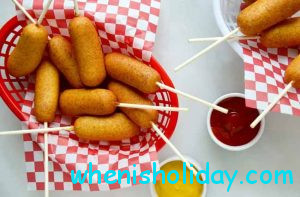 Corn Dogs with ketchup and mustard