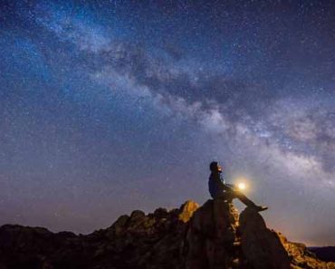 man looking at the sky