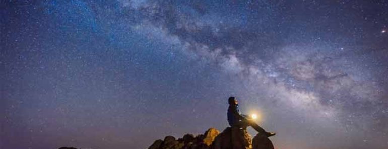 man looking at the sky